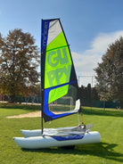 Sailboat MiniCat Guppy sitting on the lawn