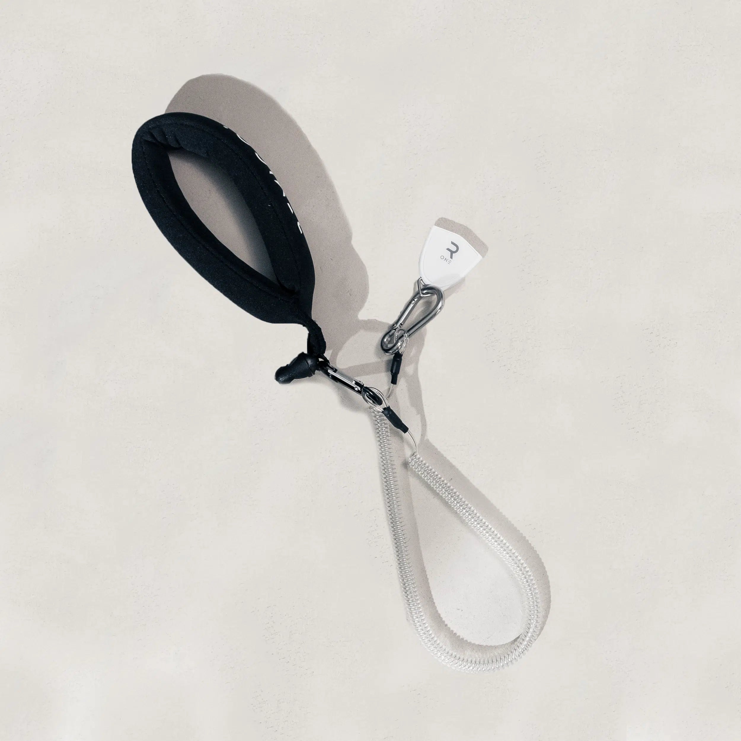 Black and white magnetic key on a black color 