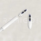 White electronic device with blue lights on a light gray background