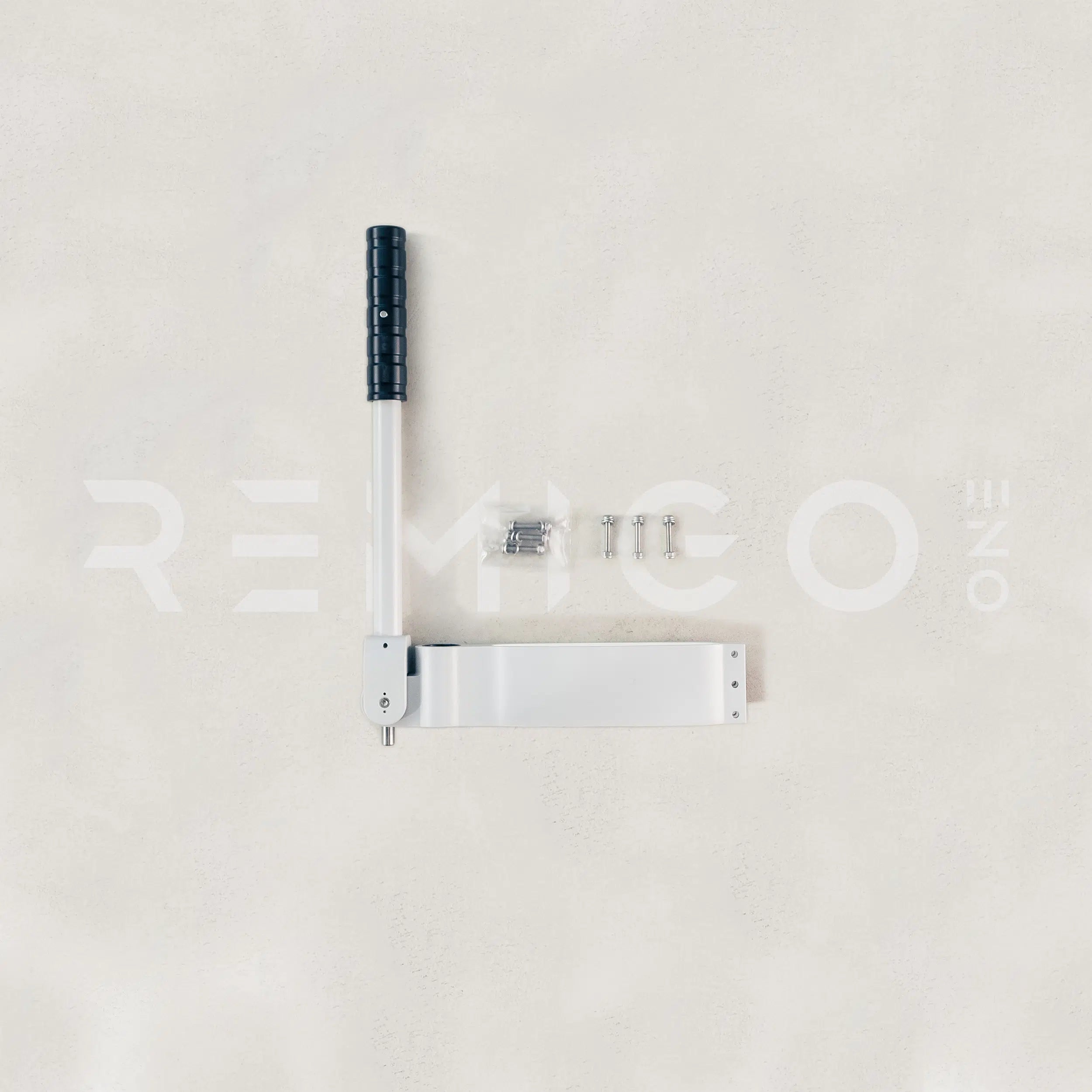 Metal handle and lock mechanism on a light gray background